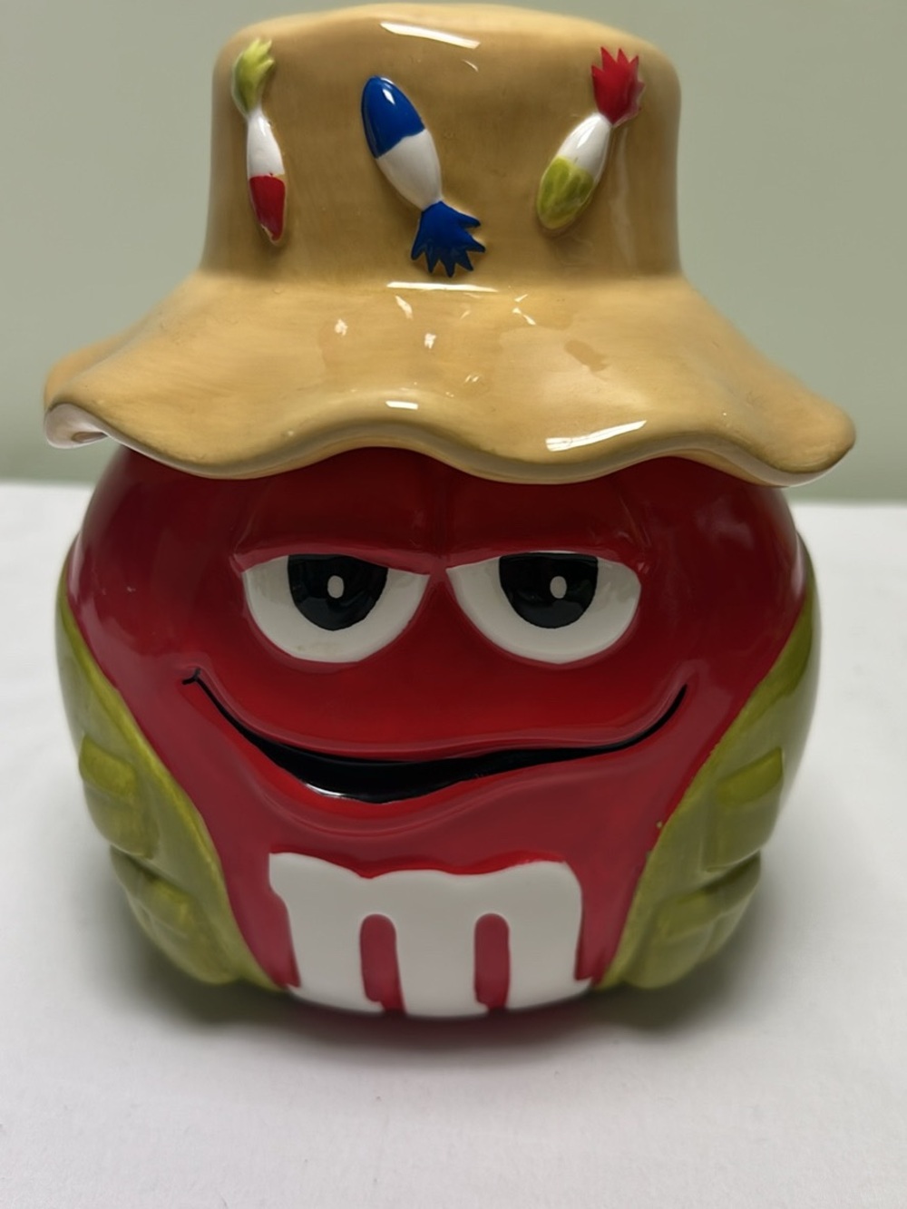 M&M'S Red Character Ceramic Jar with Tan Hat and Green Accents
